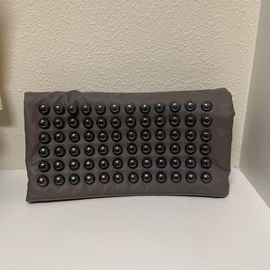 Grey clutch with rounded studs